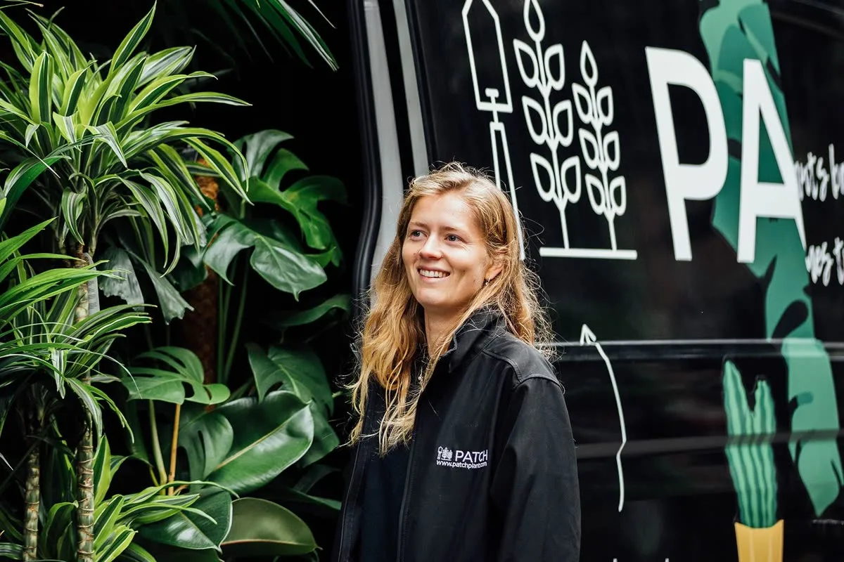 A Patch team member with a Patch-branded delivery van